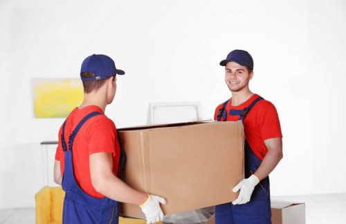 Professional packing team preparing boxes for a Uxbridge home move