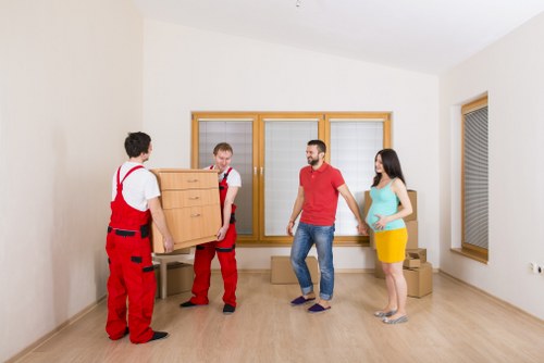 Packed boxes and furniture ready for transport during a move