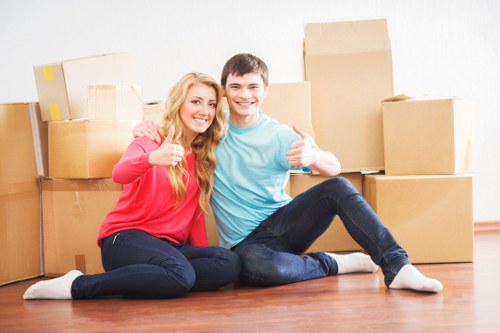 Protected wooden and glass furniture items ready for secure storage